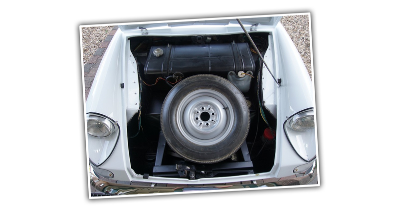 Illustration for article titled This Is A Real Car That Kept Its Engine in a Box in the Trunk